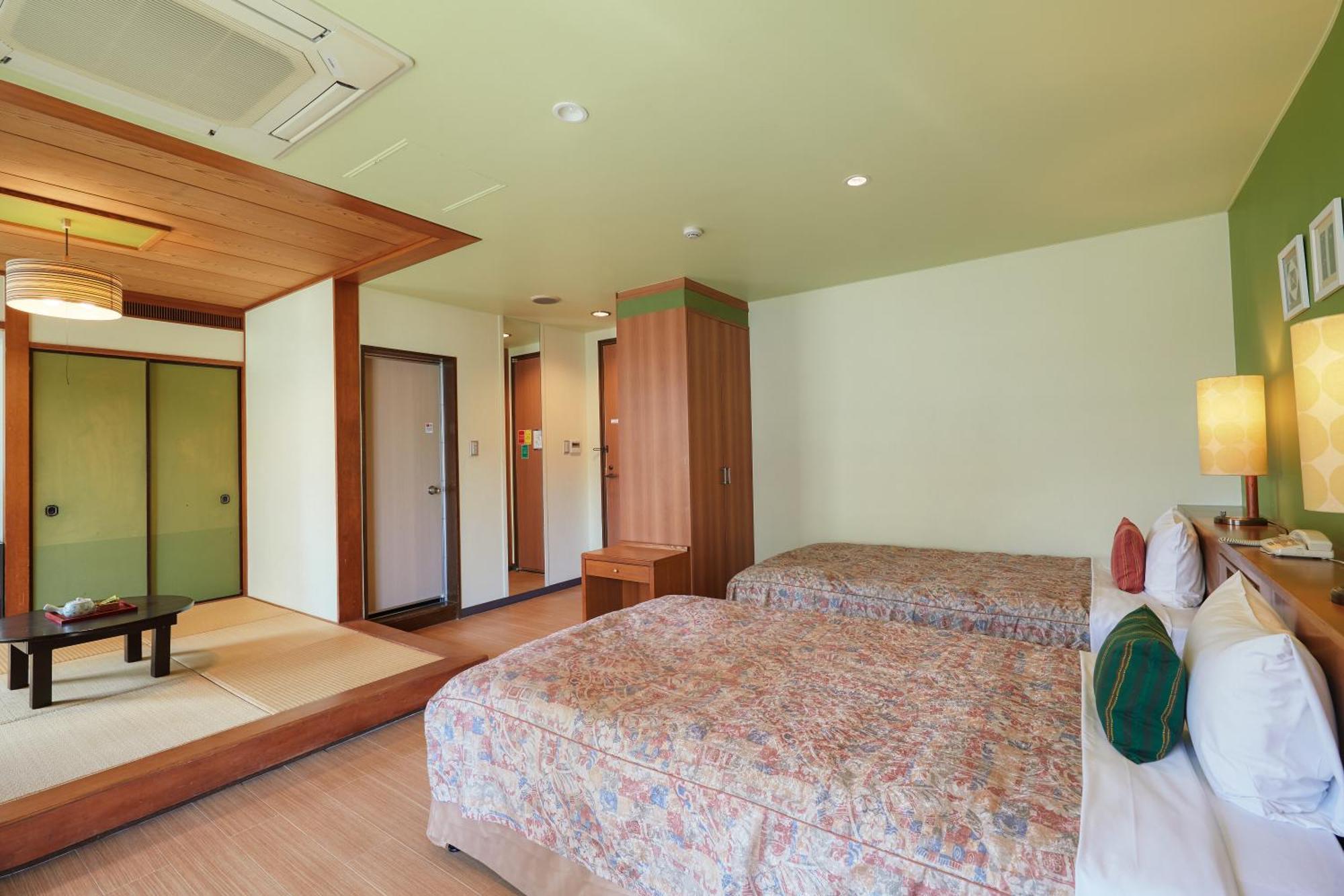 Sun Palace Kyuyokan Naha Habitación foto